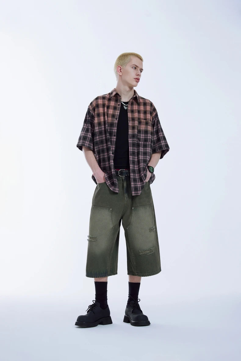Zerrissene Carpenter-Jeans mit weitem Bein