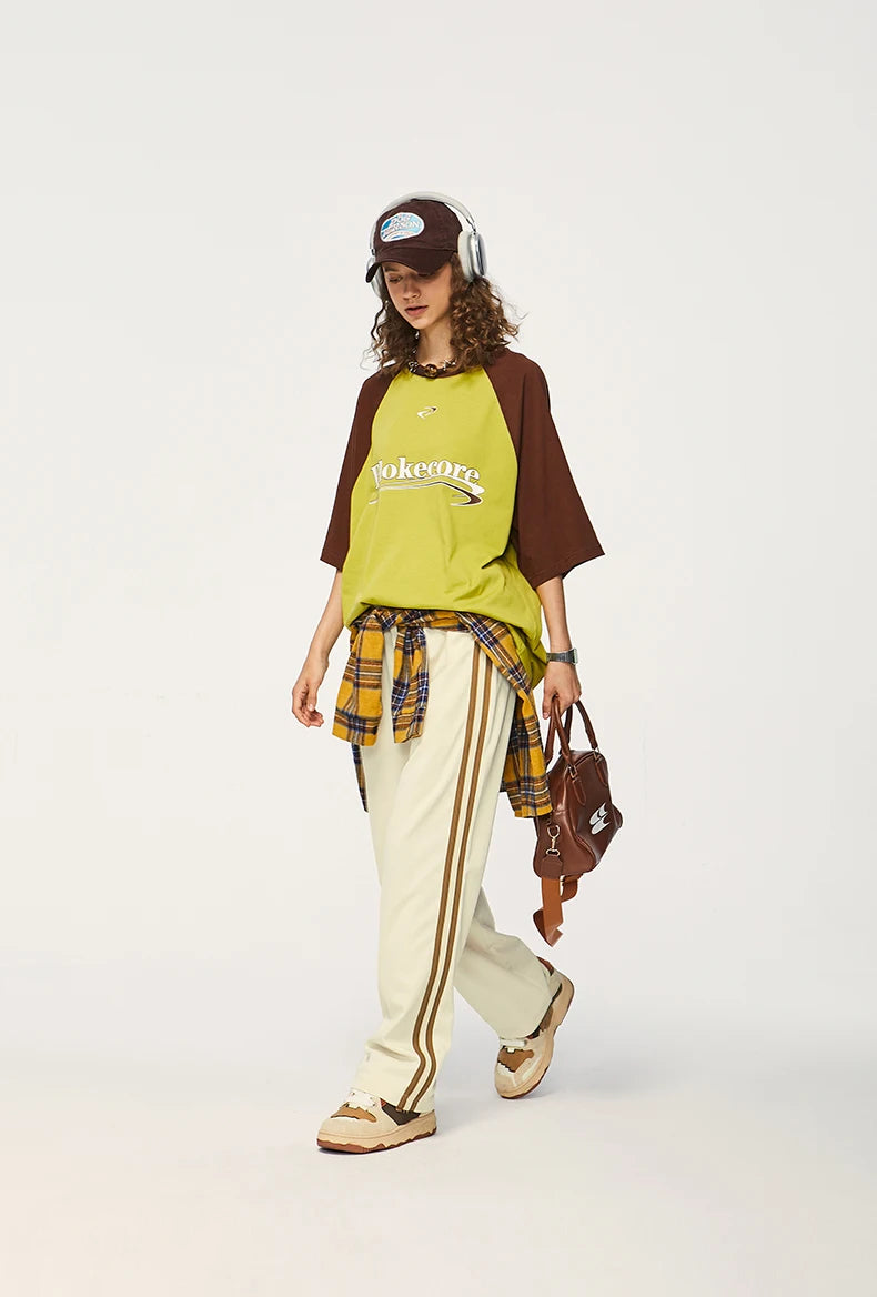 Pantalones deportivos a rayas con cintura elástica
