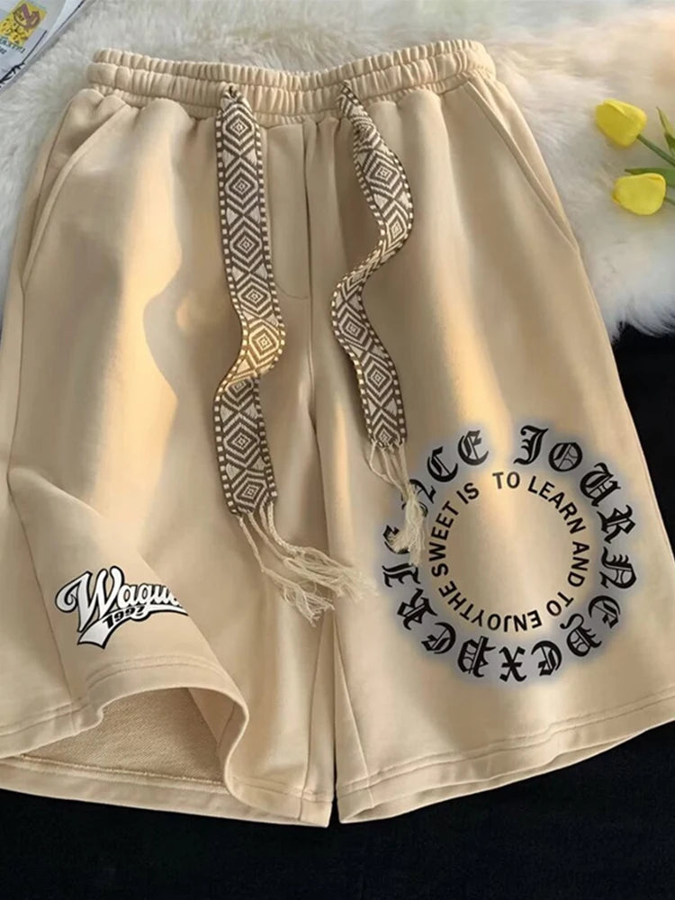 Shorts holgados con estampado de letras negras