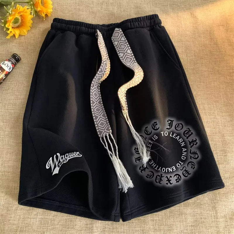 Shorts holgados con estampado de letras negras