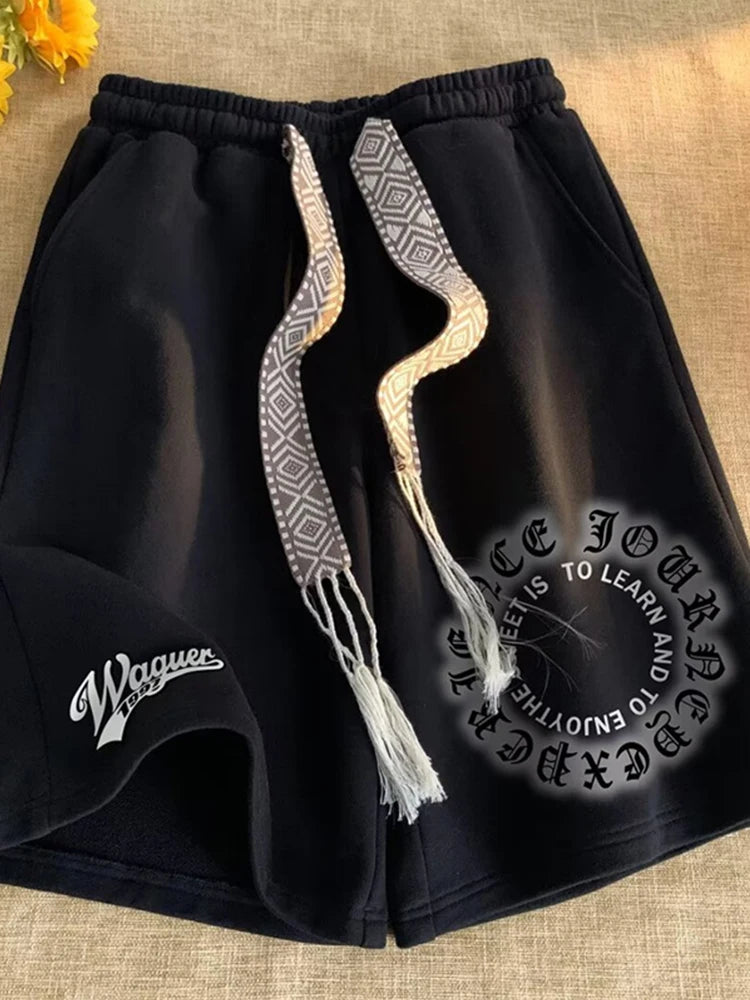 Shorts holgados con estampado de letras negras