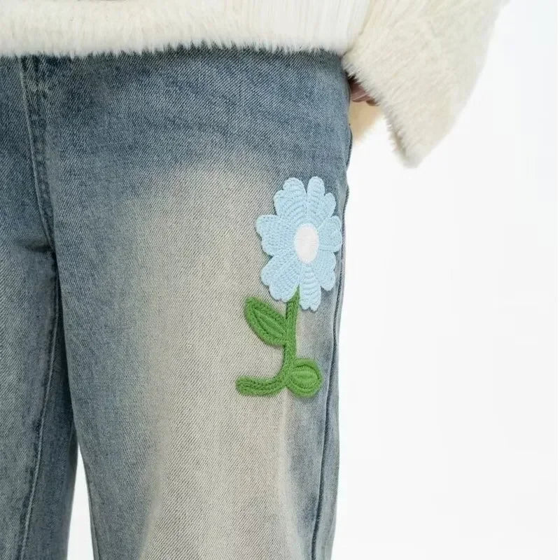 Vaqueros de calle con bordado de flores vintage
