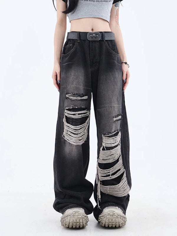 Model wearing the black Shredded Relaxed denim Jeans