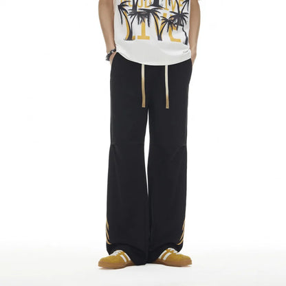 Pantalones deportivos casuales holgados con cordón elástico