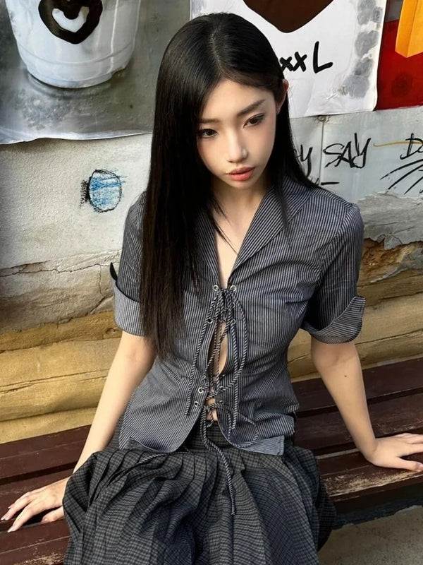Model wearing the blue Tie-Front Button-Up Shirt