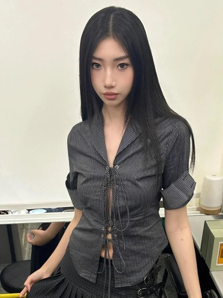 Model wearing the blue Tie-Front Button-Up Shirt