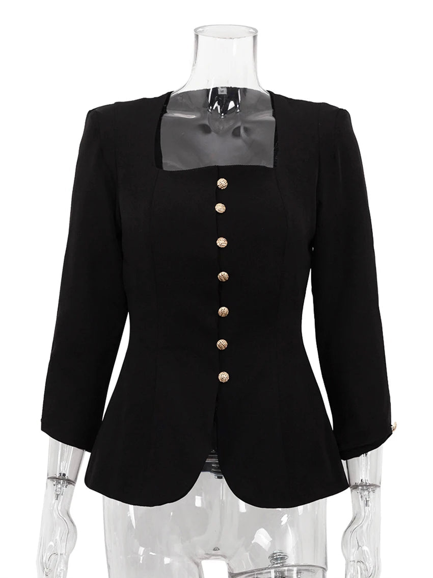 Black blazer with gold buttons on a mannequin against a white background