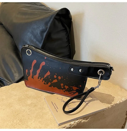 Clutches mit blutigem Messer