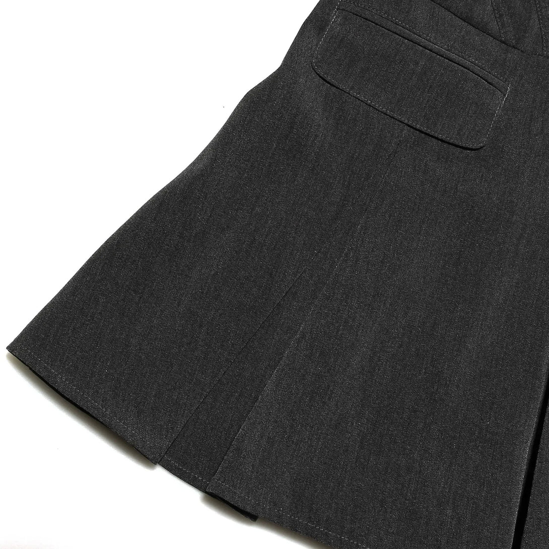 Close-up of a dark gray skirt with a pocket on a white background